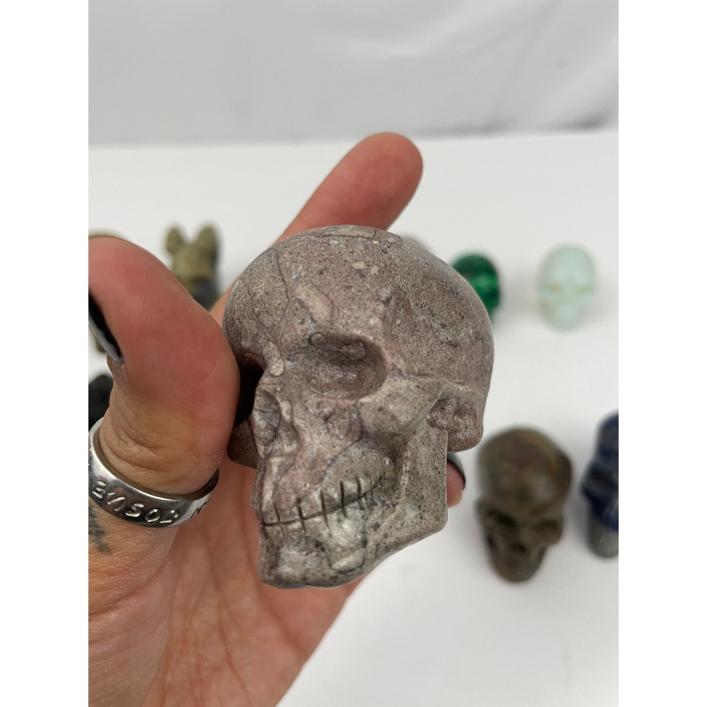 Lot of 13 Carved Skulls Unique Crystal & Resin Mixed